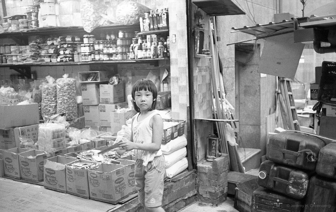 Child playing in Central Market, Hong Kong