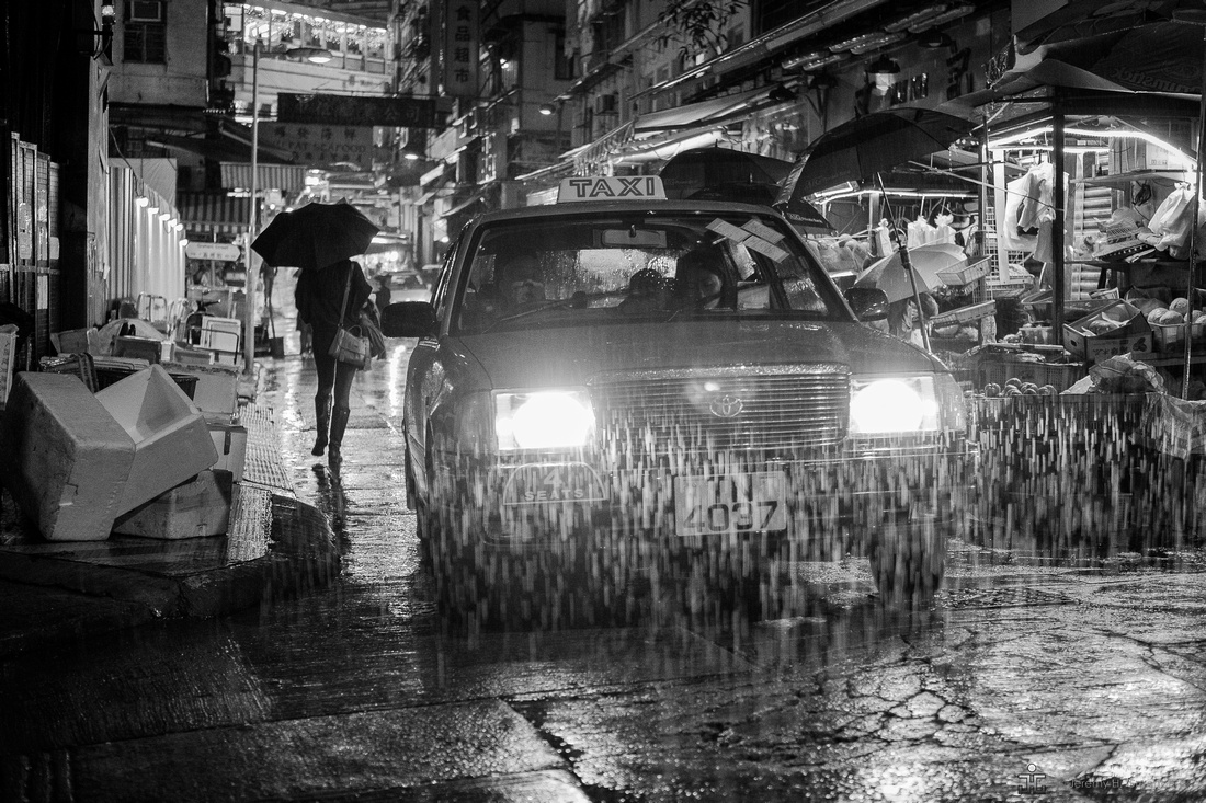 Taxi in the Rain at Night